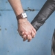 two people holding hands