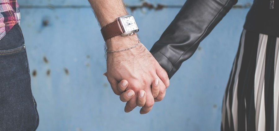 two people holding hands